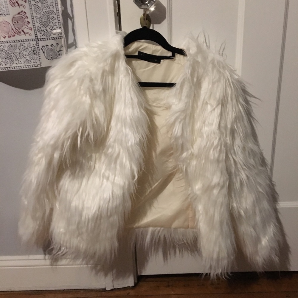 white faux fur coat
